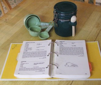 cook books and measuring cup