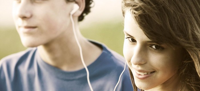 teens sharing a song