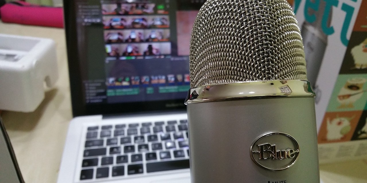 Microphone in front of a laptop screen