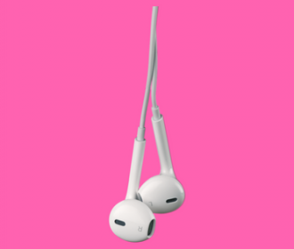 white ear buds on pink background