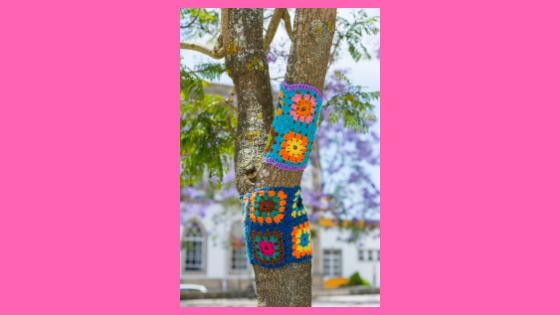 Tree with a knitted afghan on its branches