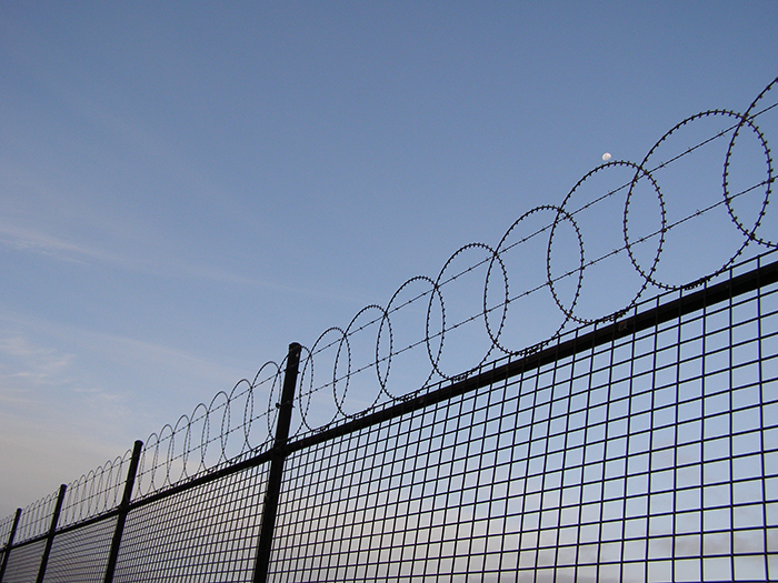 fence with barbed wire