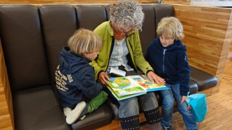 granny reading with kids