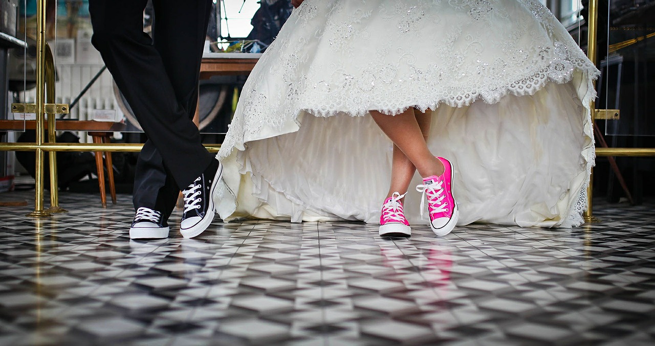 bride and groom in sneakers