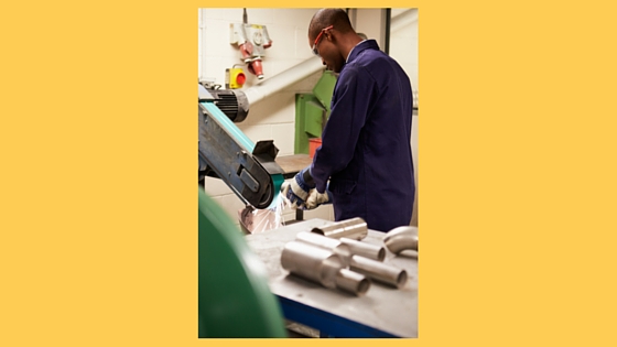 Man working with tools in a workshop