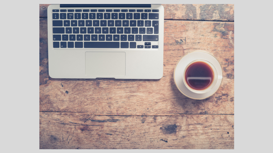 laptop with cup of coffee