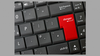 black keyboard with red 'danger' key