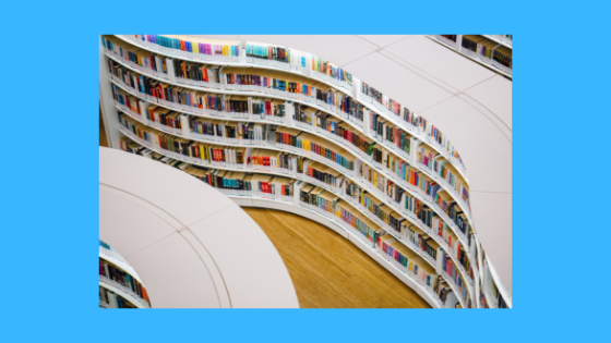 photo of a library with curving book stacks