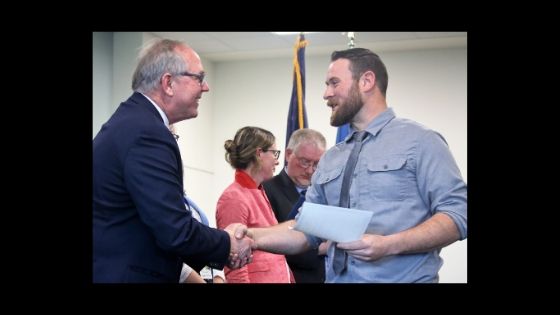 image of two men shaking hands