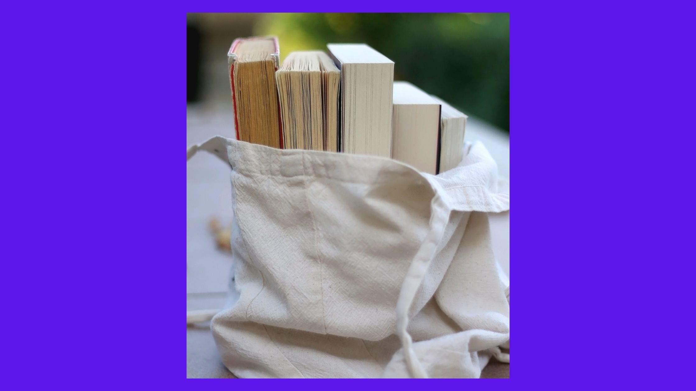 photo of a book bag with books showing