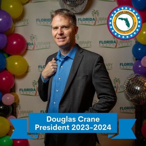 picture of doug crane background with balloons and florida library association logo blue ribbon across fron of pic says Douglas crane President 2023-2024