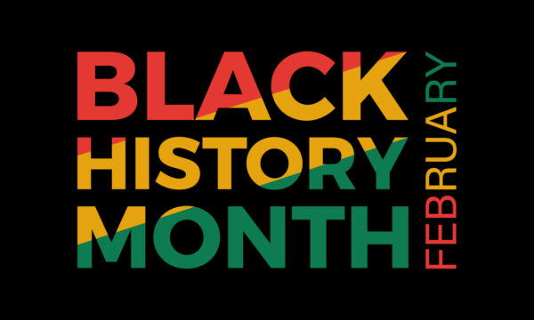 Black History Month words stacked in red yellow and green with the word February running vertically alongside the stack in same colors all on a black background